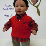 Doll That Looks Like Your Child dressed in red vest