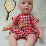 Doll That Looks Like Your Child Wearing Red Check Romper