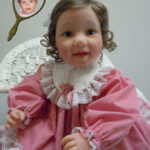 Doll That Looks Like Your Child Wearing Rose Dress