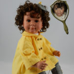 Doll That Looks Like Your Child Wearing Yellow Coat