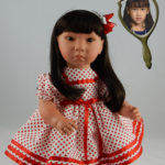 Doll That Looks Like Your Child Dressed in Red Polka Dots
