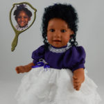 Doll That Looks Like Your Child Wearing White Lace with Purple