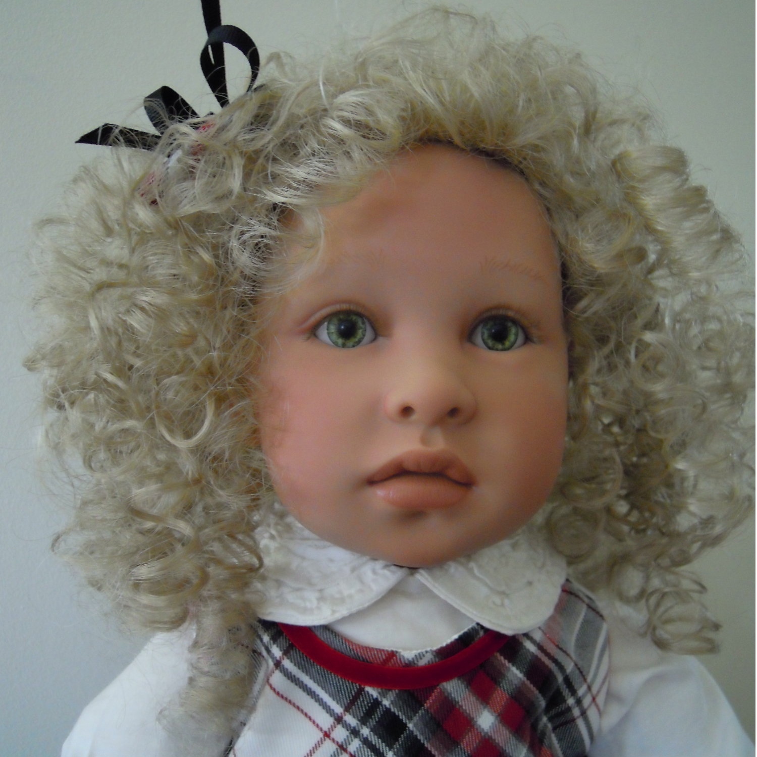 Modacrylic doll wig by Monique
